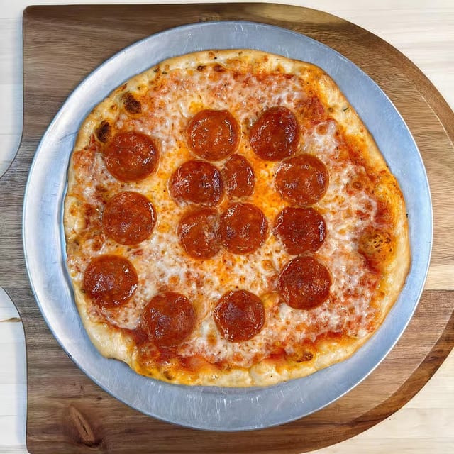 8" 1 Topping Pizza.